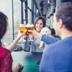 Group of Friends Drinking Beer at Bar, talking having fun